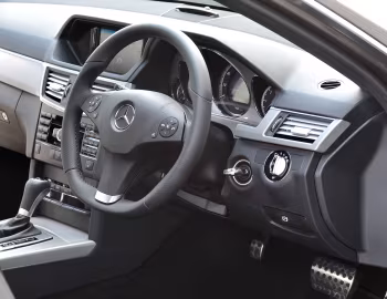 Інтер'єр Mercedes-Benz E 220 CDI AMG Sports Package [UK-spec] (W212) '2009–12