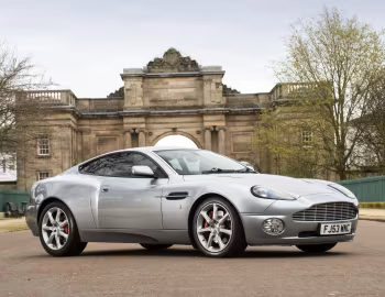 Aston Martin V12 Vanquish [UK-spec] '2001–06