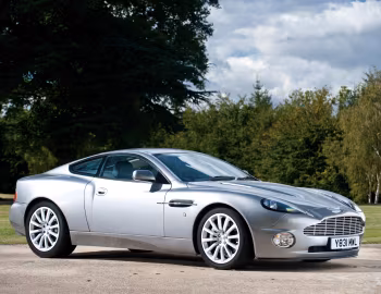 Aston Martin V12 Vanquish [UK-spec] '2001–06