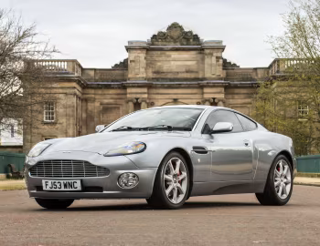 Aston Martin V12 Vanquish [UK-spec] '2001–06