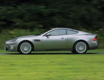 Aston Martin V12 Vanquish [UK-spec] '2001–06