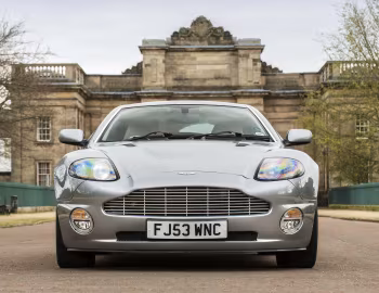 Aston Martin V12 Vanquish [UK-spec] '2001–06