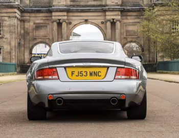 Aston Martin V12 Vanquish [UK-spec] '2001–06