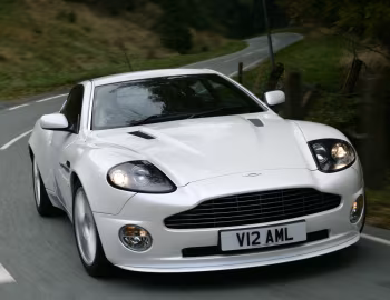 Aston Martin V12 Vanquish S [UK-spec] '2004–07