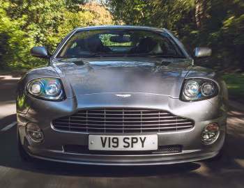 Aston Martin V12 Vanquish S [UK-spec] '2004–07