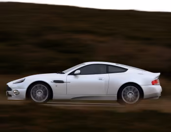 Aston Martin V12 Vanquish S [UK-spec] '2004–07
