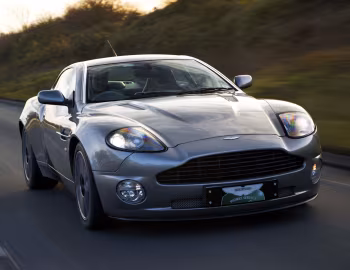 Aston Martin V12 Vanquish [UK-spec] '2001–06