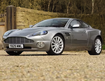 Aston Martin V12 Vanquish [UK-spec] '2001–06