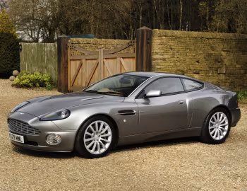 Aston Martin V12 Vanquish [UK-spec] '2001–06