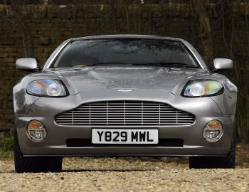 Aston Martin V12 Vanquish [UK-spec] '2001–06