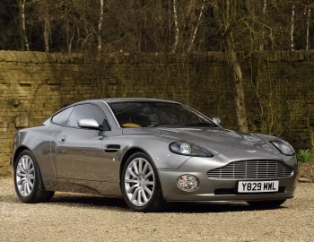Aston Martin V12 Vanquish [UK-spec] '2001–06