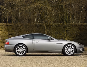 Aston Martin V12 Vanquish [UK-spec] '2001–06