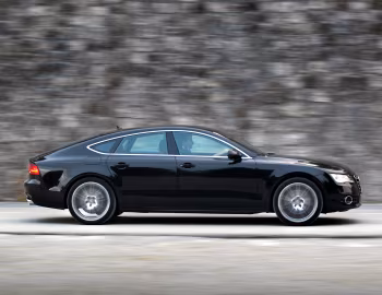 Audi A7 Sportback 3.0 TDI quattro [UK-spec] '2010–14