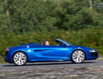 Audi R8 V10 Spyder [UK-spec] '2010–12