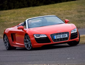 Audi R8 V10 Spyder [UK-spec] '2010–12