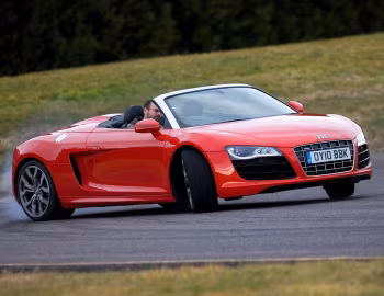Audi R8 V10 Spyder [UK-spec] '2010–12