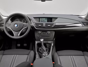 Інтэр'ер BMW X1 xDrive20d [Worldwide] (E84) '2009–12