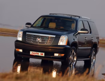 Лаура Cadillac Escalade '2009–14