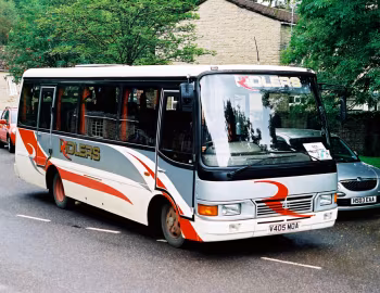 Toyota Coaster BB50R Caetano Optimo IV [UK-spec] (C22F) '06.1998–05.2000