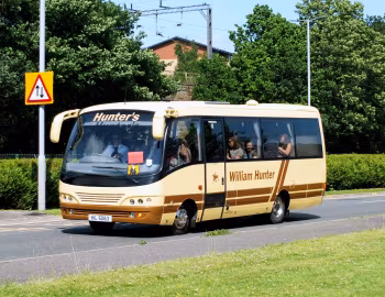 Toyota Coaster BB50R Caetano Optimo V [UK-spec] (C18F) '06.2000–05.2006