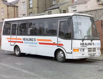 Toyota Coaster HZB50R Caetano Optimo III [UK-spec] (C21F) '11.1993–09.1997