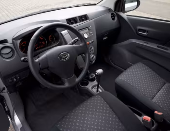 Интерьер Daihatsu Cuore (L276) '2007–11