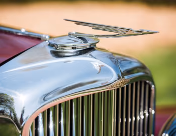 Маскот 1929 Duesenberg J 119/2551 Disappearing Top Convertible Coupe SWB by Murphy