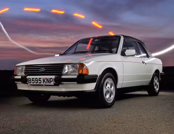 Ford Escort 1.6i Cabriolet [UK-spec] '1983–86