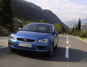 Ford Focus Ghia 5-door [Worldwide] (DA3) '2004–08