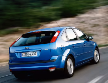 Ford Focus Ghia 5-door [Worldwide] (DA3) '2004–08