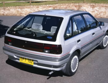 Ford Laser Ghia 5-door [Australia] (KE) '10.1987–03.1990