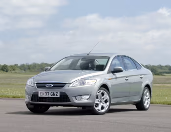 Ford Mondeo Ghia 4-door [UK-spec] '2007–10