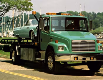 Freightliner FL 70 Roll-On Wrecker Truck '1997–2000
