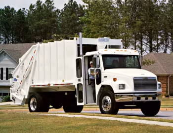 Freightliner FL 70 Stand-Up RHD Refuse Truck '1997–2000