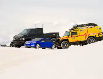 Chevrolet Corvette Stingray "Sideswipe" Concept, GMC C4500 TopKick "Ironhide", Chevrolet Volt "Jolt", Hummer H2 Search & Rescue "Ratchet"