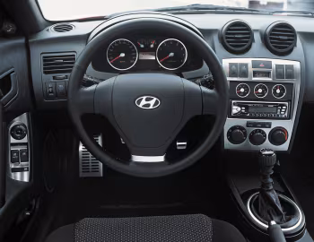 Передня панель Hyundai Coupé [Worldwide] (GK) '2002–05