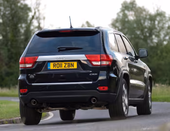 Jeep Grand Cherokee Overland Summit [UK-spec] (WK2) '2011–13