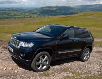 Jeep Grand Cherokee Overland Summit [UK-spec] (WK2) '2011–13