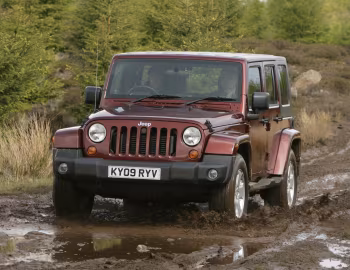 Jeep Wrangler Unlimited Sahara [UK-spec] (JK) '2007–10