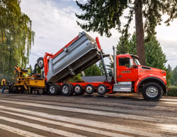 Caterpillar AP-Series Asphalt Pavers, Kenworth T880S OSW Super Dump