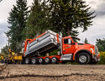 Caterpillar AP-Series Asphalt Pavers, Kenworth T880S OSW Super Dump
