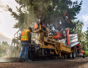 Caterpillar AP-Series Asphalt Pavers, Kenworth T880S OSW Super Dump