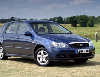 Kia Cerato Hatchback [UK-spec] (LD) '2004–07