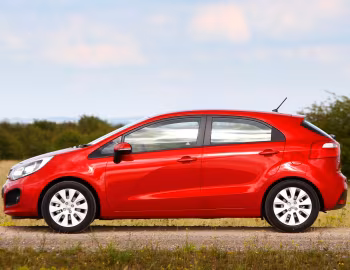 Kia Rio 5-door [UK-spec] (UB) '2011–15