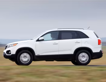Kia Sorento [UK-spec] (XM) '2009–12