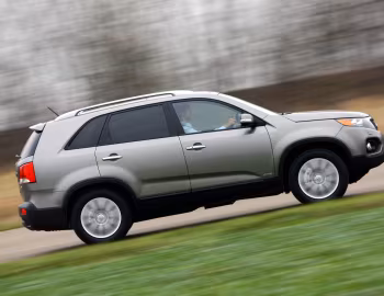 Kia Sorento [UK-spec] (XM) '2009–12