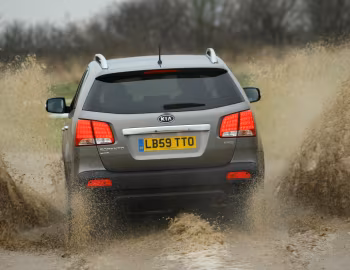 Kia Sorento [UK-spec] (XM) '2009–12