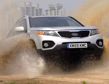 Kia Sorento [UK-spec] (XM) '2009–12