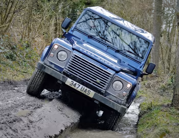 Land Rover Defender 110 Utility Wagon [UK-spec] '2009–16