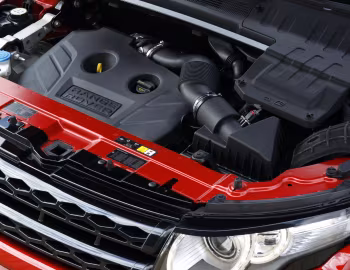 Sob o capô Range Rover Evoque Coupe Si4 Dynamic [UK-spec] '2011–15